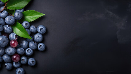 Obraz na płótnie Canvas Midnight Delight: Blueberries on a Stylish Black Background