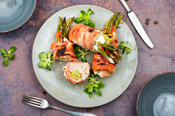 Beef meat rolls with young asparagus.