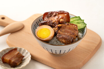 Braised pork belly meat over cooked rice, famous and delicious street food in Taiwanese restaurant.