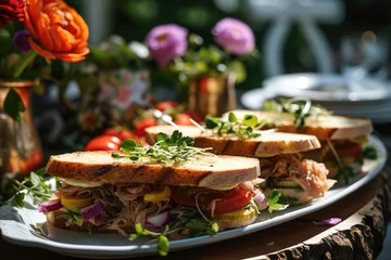 Foto op Plexiglas Tuna sandwiches on a tray on a table at a garden party. Generative AI. © visoot