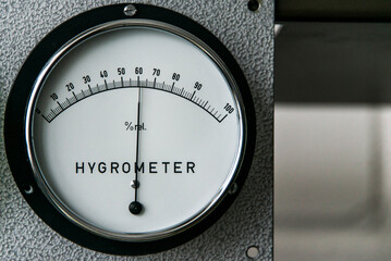 hygrometer manometer humidity measurement on a industrial metal wall - obrazy, fototapety, plakaty