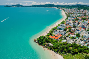Holiday beach with resort town and turquoise ocean in Brazil. Aerial view - obrazy, fototapety, plakaty