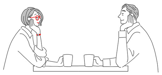 向き合ってコーヒーを飲むシニア夫婦