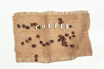 Coffee beans on a brown bag, coffee beans in a bag