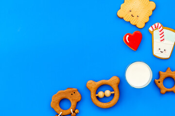 Funny cookies in shape of milk in glass and biscuit with kids toys