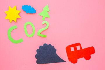 Kids paper car and traffic fumes - CO2 carbone dioxide control concept