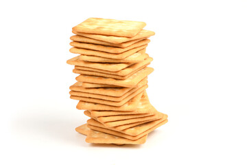 Square shortbread cookies isolated on white background. Stacked butter biscuits for coffee or tee.