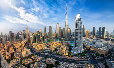 Panoramic view of the downtown Business Bay district skyline of Dubai, UAE, during sunrise - obrazy, fototapety, plakaty