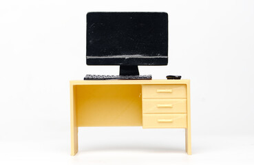 A picture of desktop on desk miniature on isolated white background.