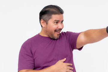 A middle aged man pointing at something while looking hyped, energized or maniacal. Choosing you....