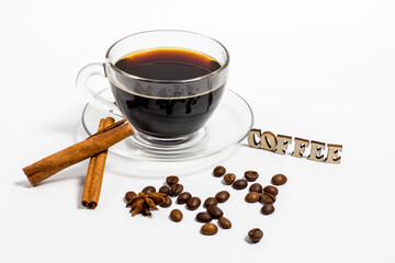 Black coffee in a glass mug on a white background, aromatic coffee for energy