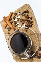 Black coffee in a glass mug on a white background, aromatic coffee for energy