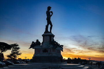 The replica of Michelangelo's David statue in Michelangelo Square during sunset in Florence, Italy....