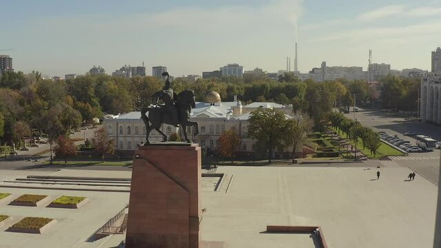 Aerial view of the Monument to the hero Manas the Magnanimous on horseback. Ala-Too Square. Bishkek city center. Travel to Kyrgyzstan.