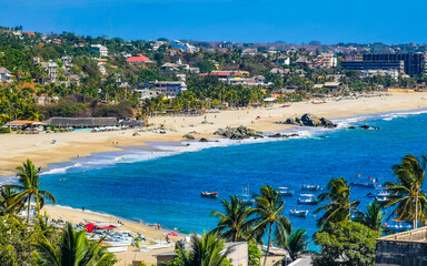 Sun beach sand surfer waves palms in Puerto Escondido Mexico. - obrazy, fototapety, plakaty