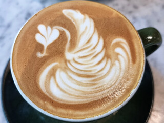 Sideway shop coffee, Close-up of Swan latte art coffee background