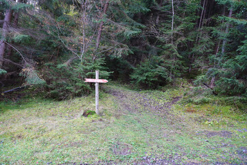Arrow sign to Mount Hoverla direction hanging peak of the Ukrainian Carpathians