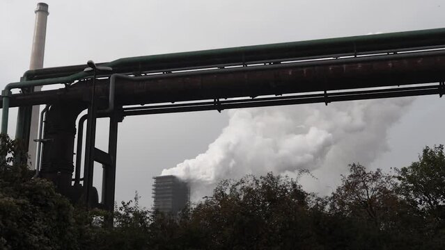 Coke oven emissions, smoke from the chimney of thyssenkrupp steel plant in Duisburg, Germany