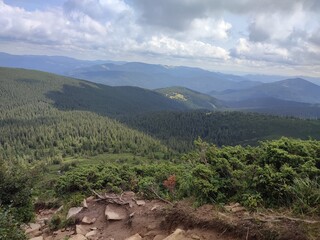 A view of the mountains from a height in the warm season