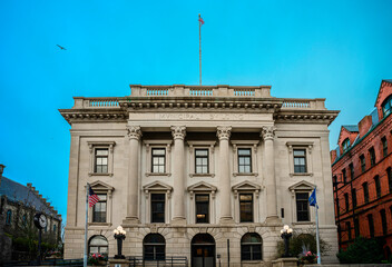 Fototapeta premium New London City Hall in Connecticut, built in 1856 with an imposing classical Beaux-Arts exterior, is one of the oldest continuously used city hall buildings in America