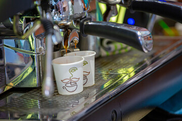 Barista coffee service concept.Barista women using coffee machine to make coffee in cafe