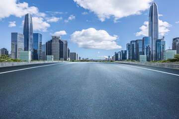 Empty asphalt road and city buildings skyline in Shenzhen - obrazy, fototapety, plakaty