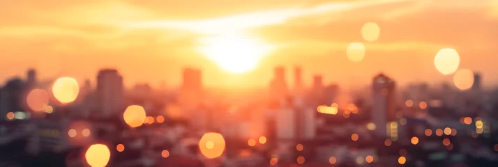 Poster Summer sun blur golden hour hot sunset sky with city rooftop view background cityscape office building landscape blurry urban warm bright heat wave lights skyline heatwave bokeh for evening party © john