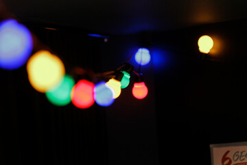 colorful light bulbs in foreground and background