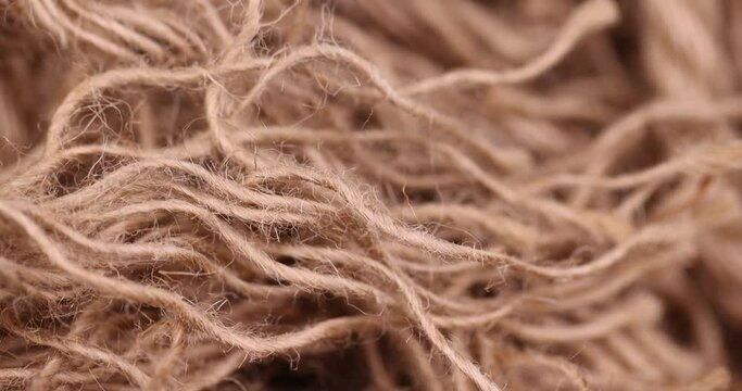 rough linen rope close-up, rough rope on a wooden table