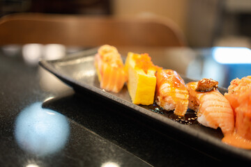 Tasty sushi set served on a tray. Japanese food