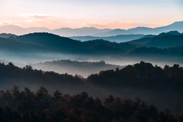 Fotobehang Sunrise over the Great Smoky Mountains in Tennessee. These Blue Ridge mountains are like no other! © Huntley.Design