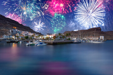New years fireworks display over the Puerto de Mogan town, Gran Canaria. Spain.