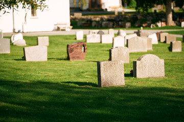 A Peaceful Day in the Historic Cemetery. Graveyard on a sunny day. Cemetery graveyard white and...