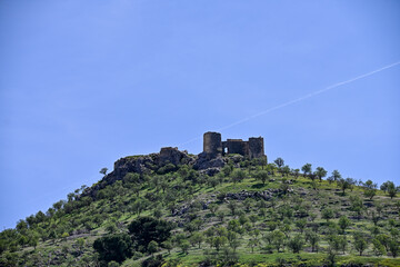 Ancient Ruins Atop a Verdant Hillside
