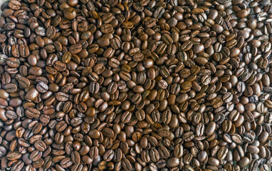 Close Up Of Coffee Beans Background. Fresh roasted coffee beans texture.