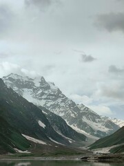 Fototapeta premium mountains in the snow with clouds