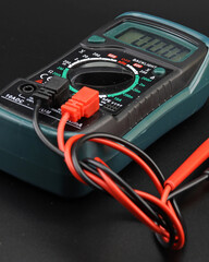 A digital multimeter for measuring the parameters of electrical circuits. - obrazy, fototapety, plakaty