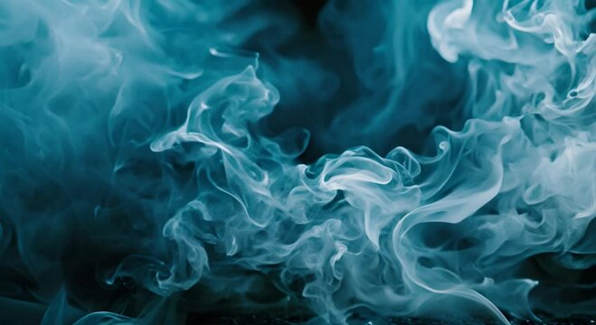 Smoke swirling in the air on a dark background.