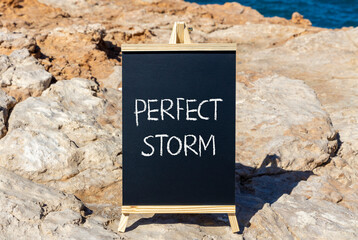 Perfect storm symbol. Concept words Perfect storm on beautiful black chalk blackboard on a...