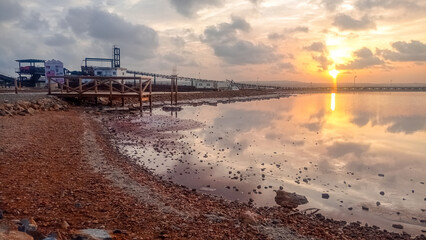 Sunset at the pink lagoon of the sea salt industry in Torrevieja, Spain