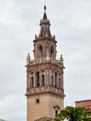 Fototapeta na wymiar Towers of Church of Ecija, town of Seville, Andalusia, Spain. Known for the city of towers for its churches.