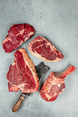 Set black angus prime beef steak variety on dark background. Steak types. top view.