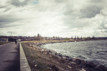 River bank in windy weather with waves