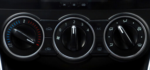 controls for heating and air direction in the vehicle interior