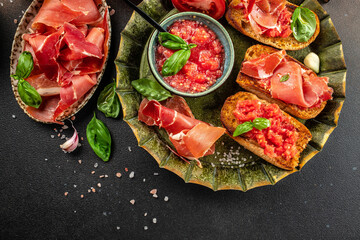 toasted bread with jamon cured ham and tomatoes for breakfast. Restaurant menu, dieting, cookbook...