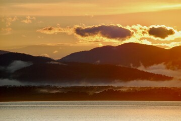 Colorful sunset on Lake Champlain, Vermont. 