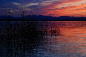 Colorful sunset on Lake Champlain, Vermont. 