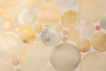 Gold nacre glitter ink watercolor circle strip stain blot on beige grain paper texture background.