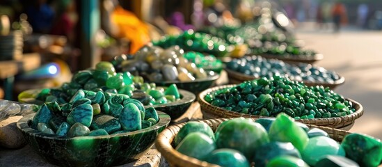 Gorgeous jade items at the Jade Market in Myanmar's Mandalay. - obrazy, fototapety, plakaty