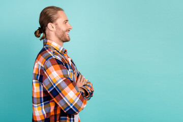 Side profile photo of handsome man with beard long hairstyle arms crossed look at sale empty space...